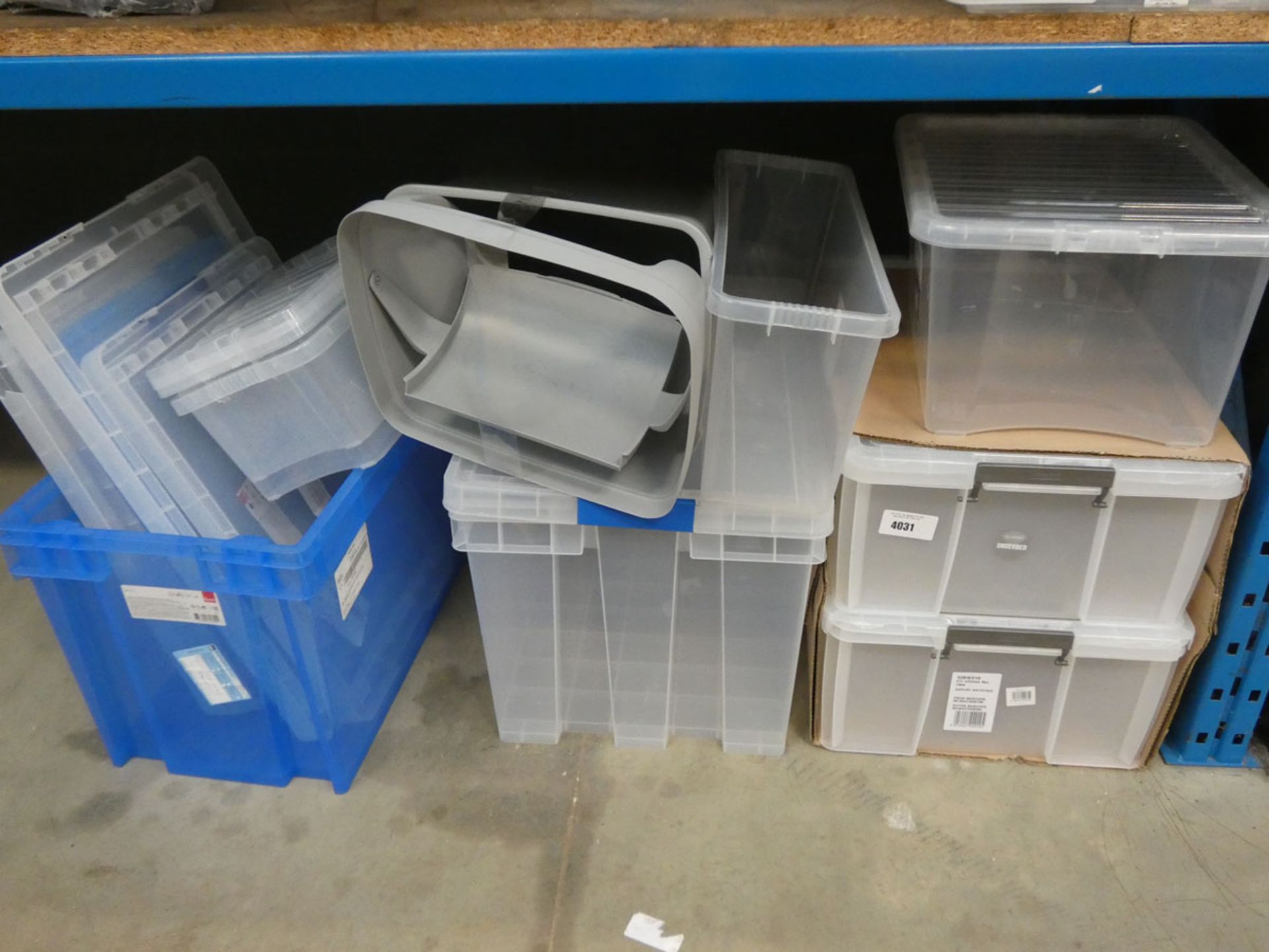 Approximately 8 plastic storage containers and lids. Various sizes