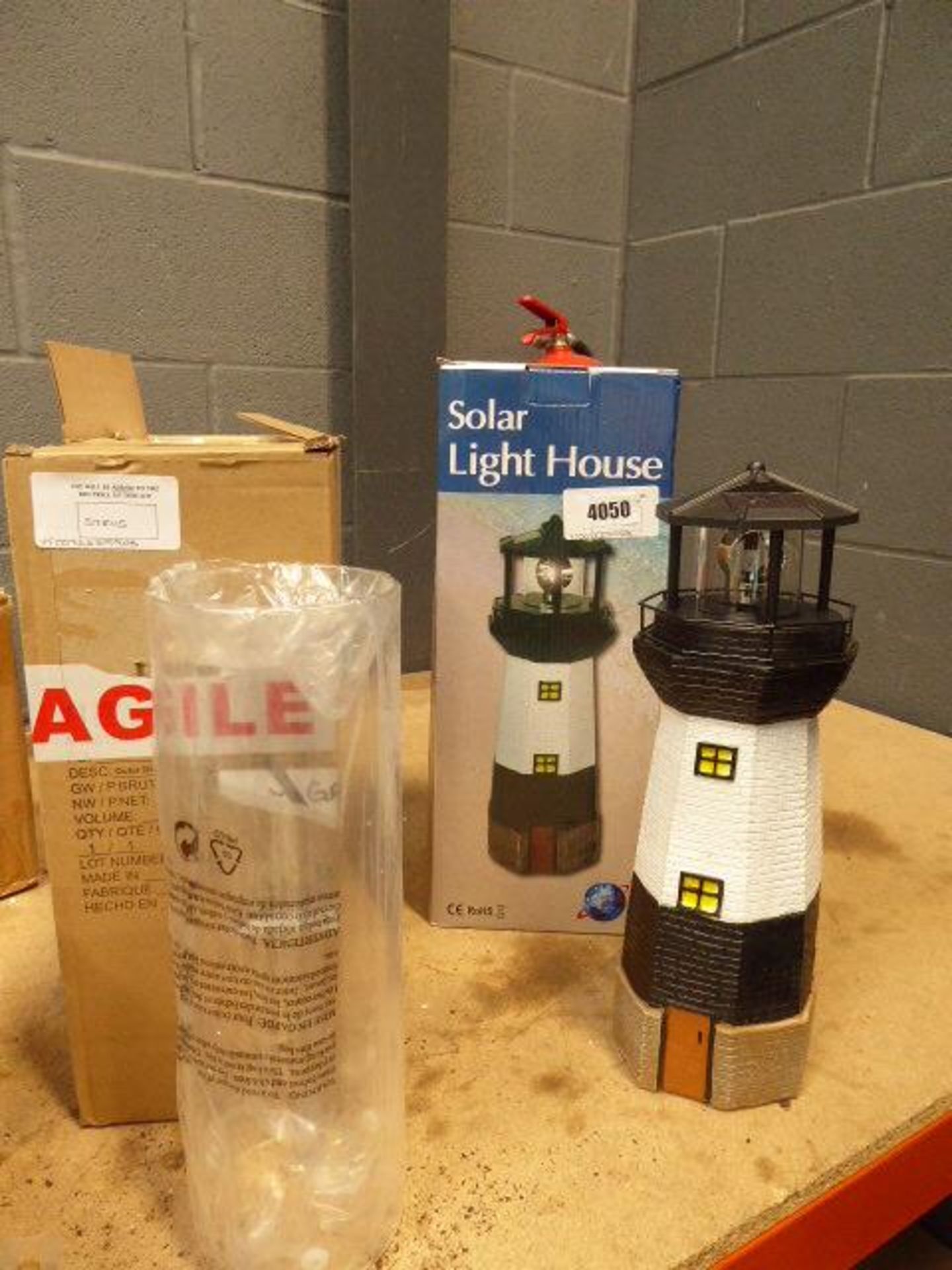 Solar lighthouse and 2 glass cylinders