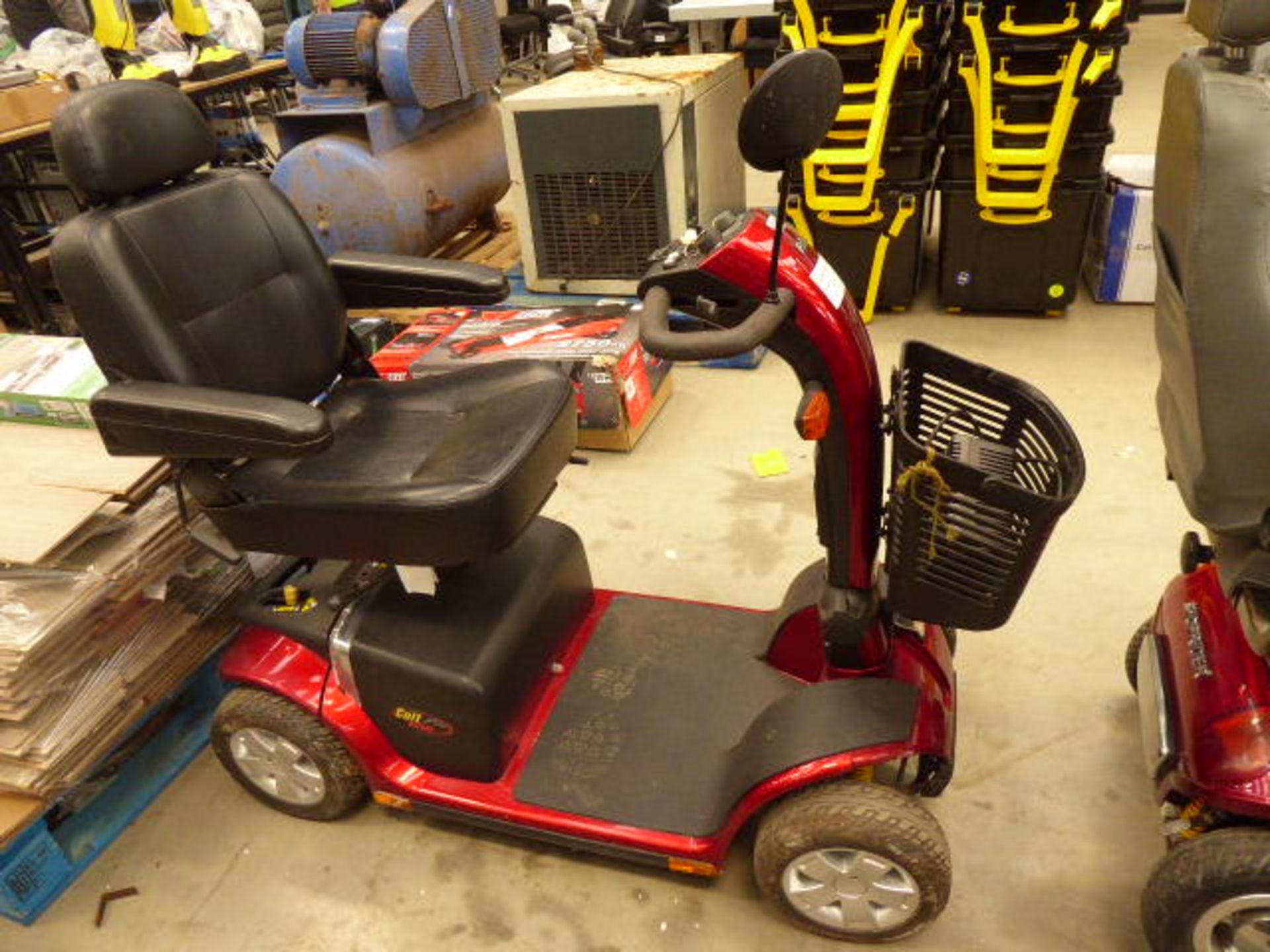 Pride red 4 wheeled mobility scooter