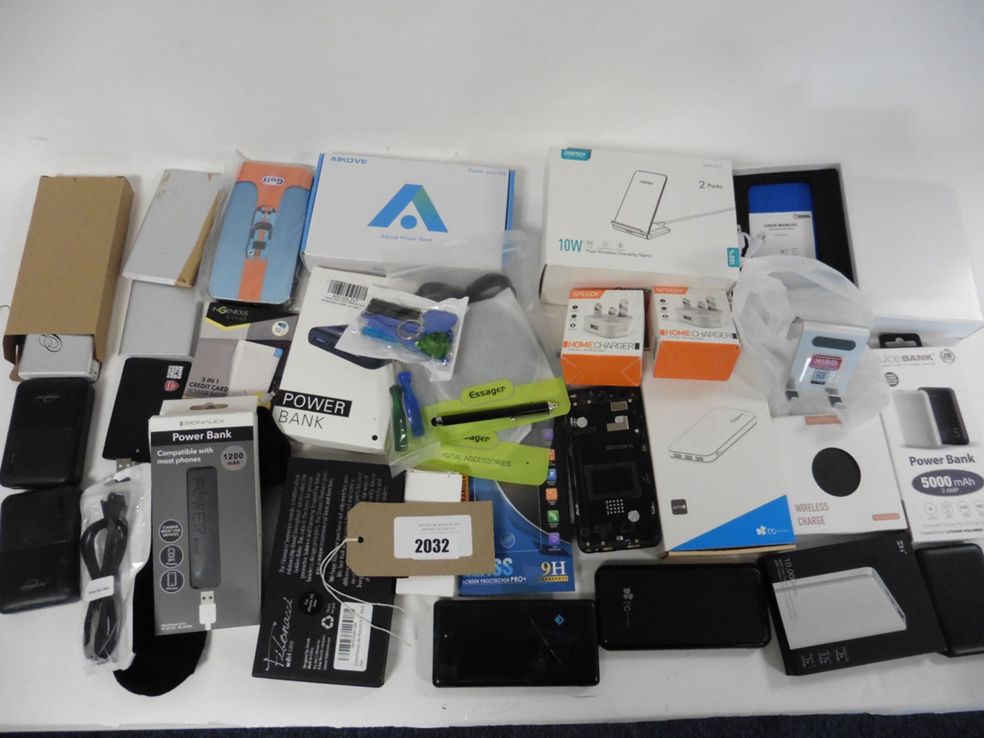 A bag of mobile phone accessories, chargers, power banks cases, screen protectors etc