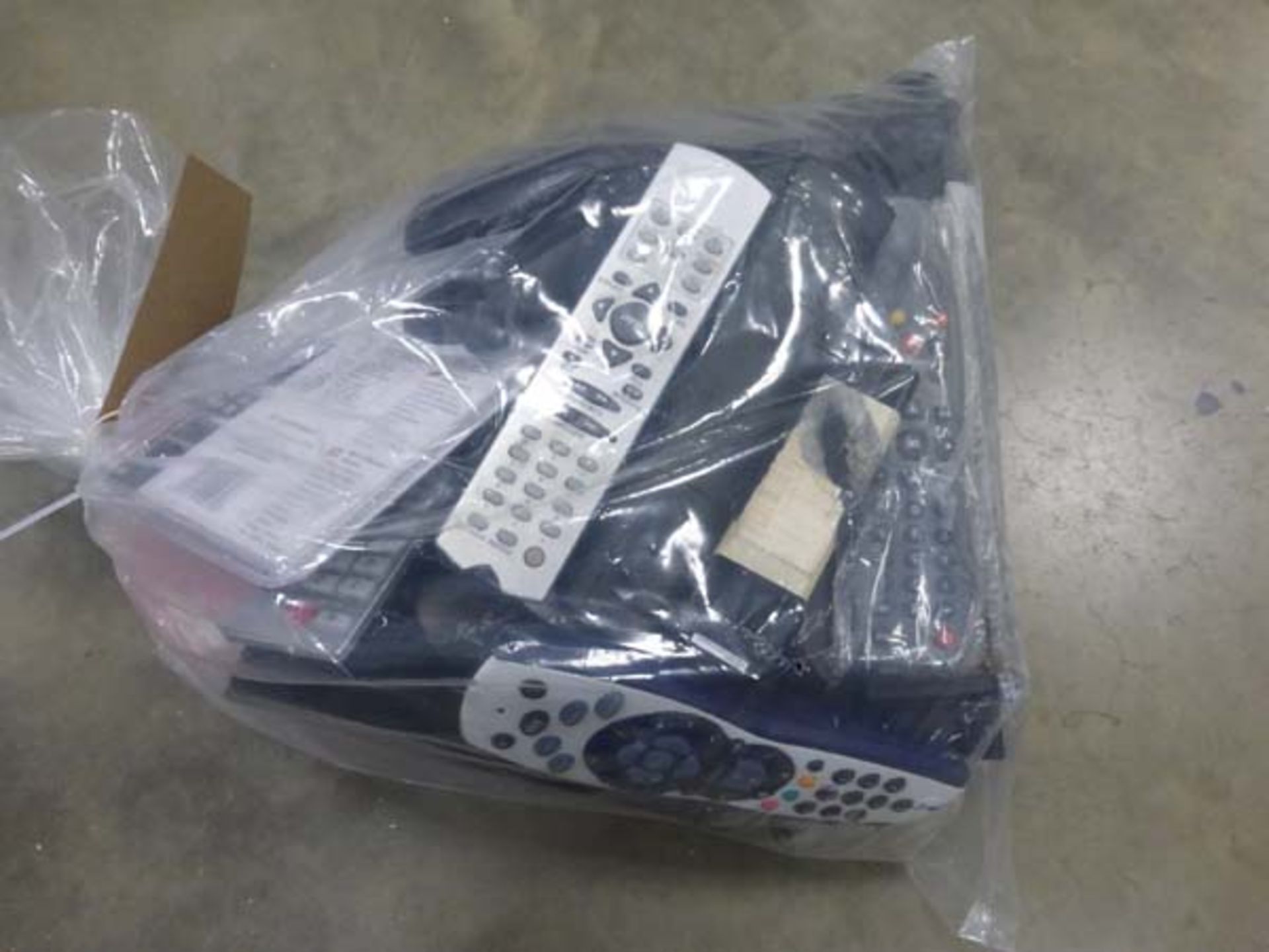 Bag containing various replacement remote controls