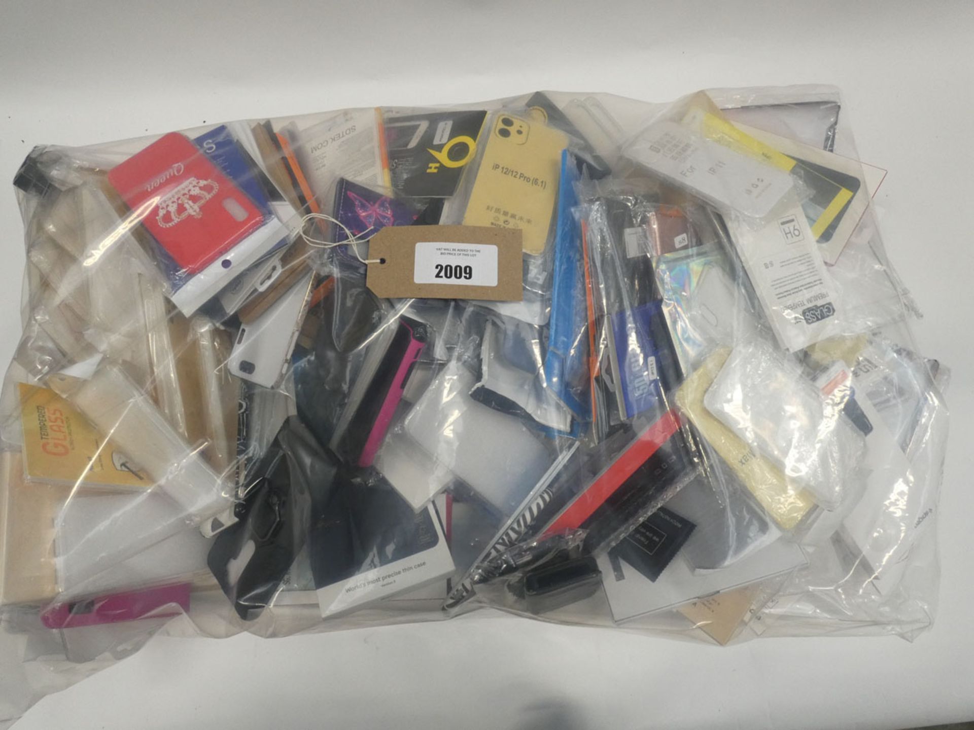 Bag containing quantity of mobile phone cases and covers