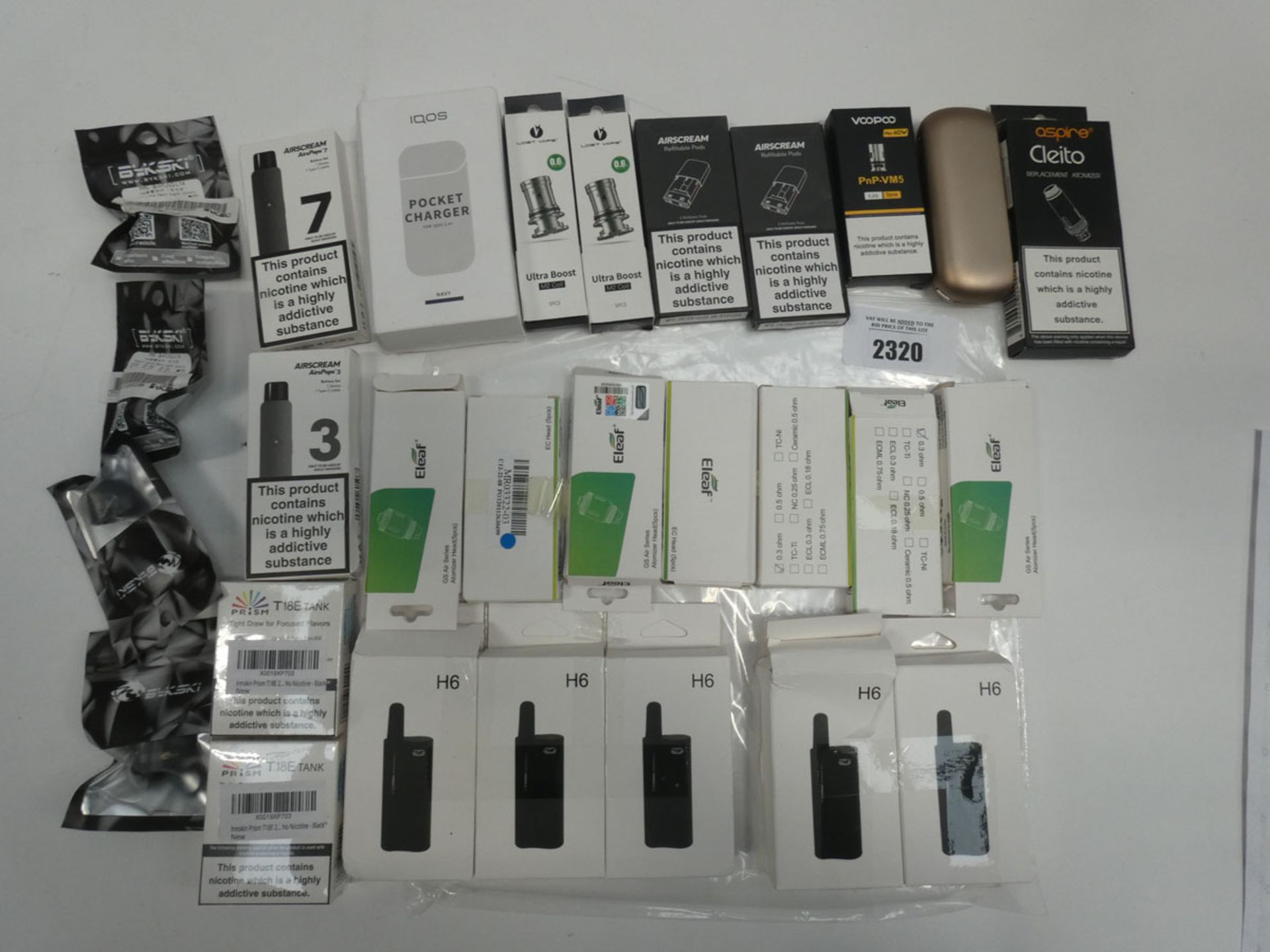 Bag containing various branded and unbranded vaping accessories