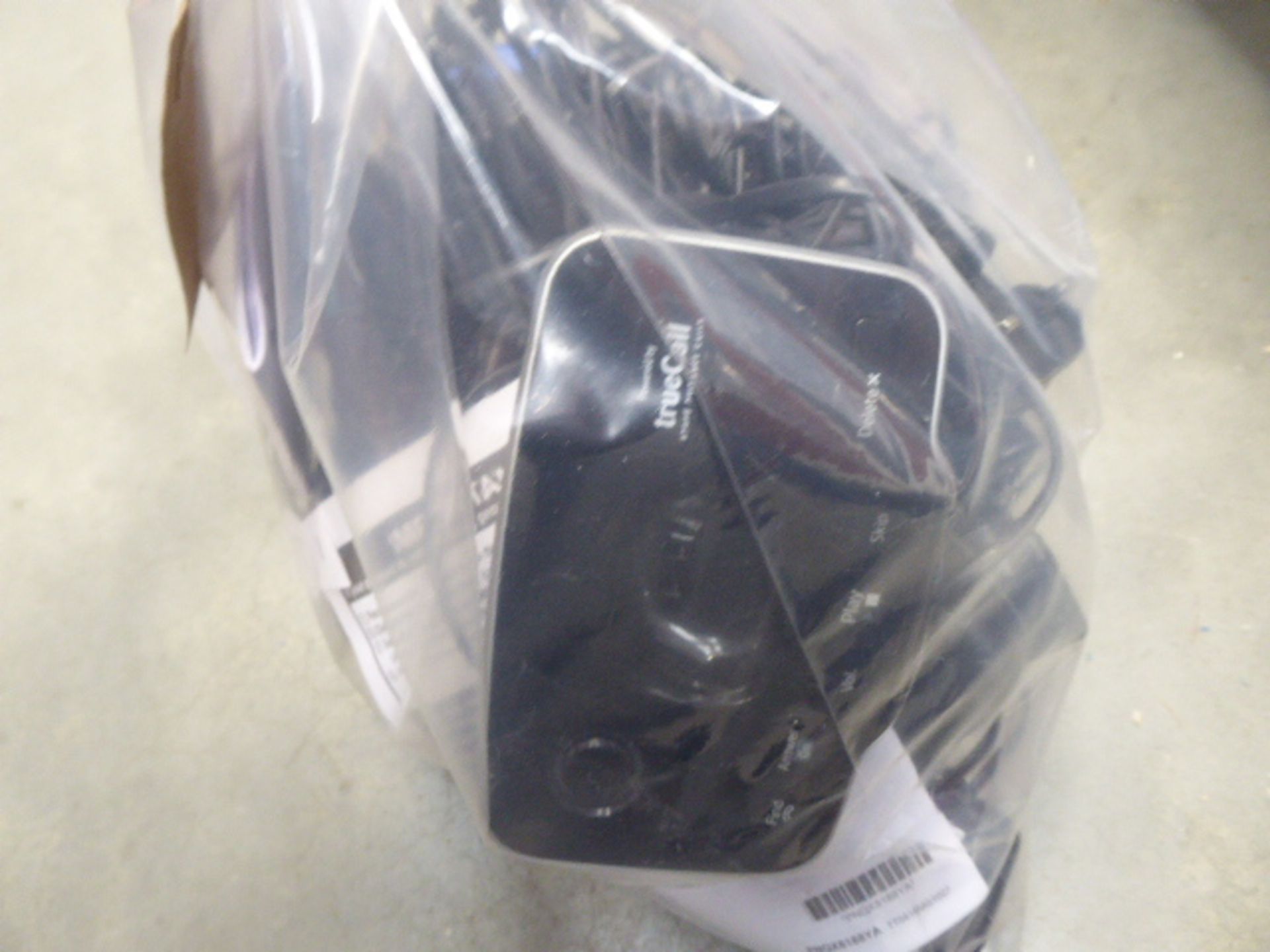 Small bag containing BT and Panasonic phone handsets