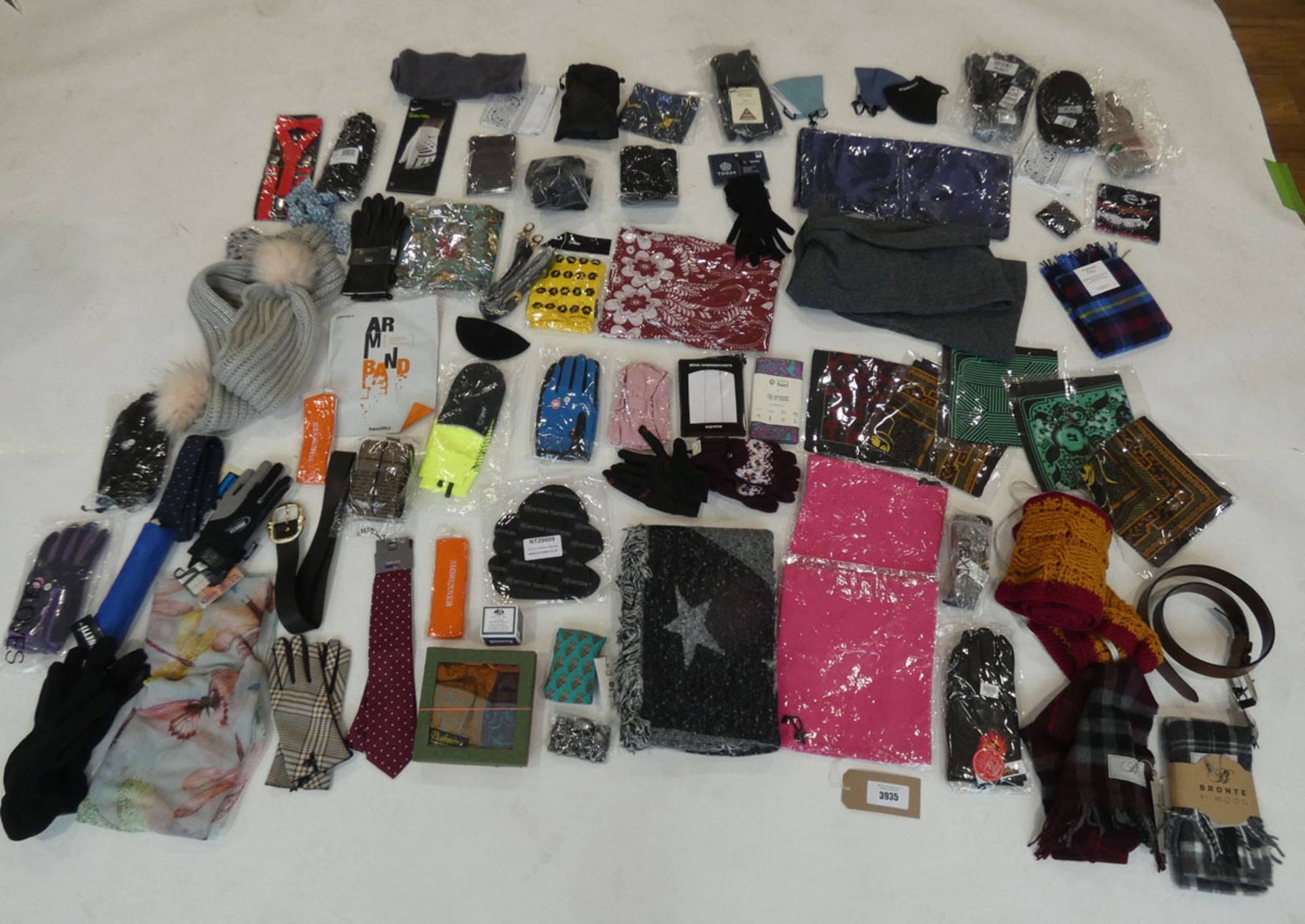 Selection of mixed ladies and men's accessories to include, scarfs, gloves, belts, etc