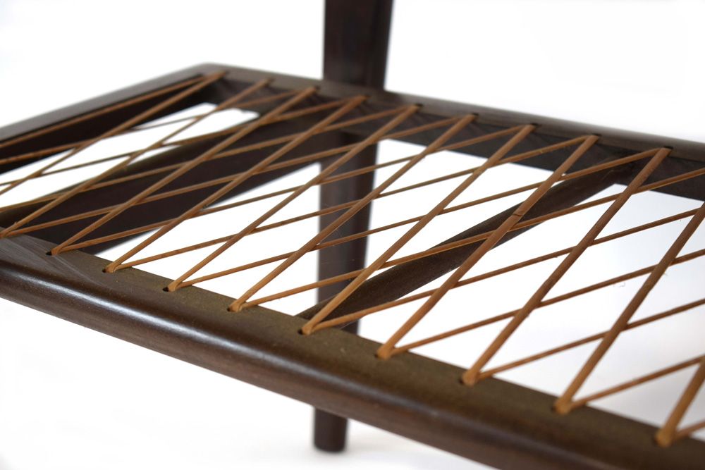 A 1960's Danish teak coffee table, the curved rectangular surface over a wicker criss-cross tier, - Image 5 of 6