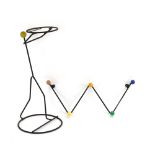 A 1950/60's metalwork umbrella stand modelled as a figure with a yellow coloured ball as a head,