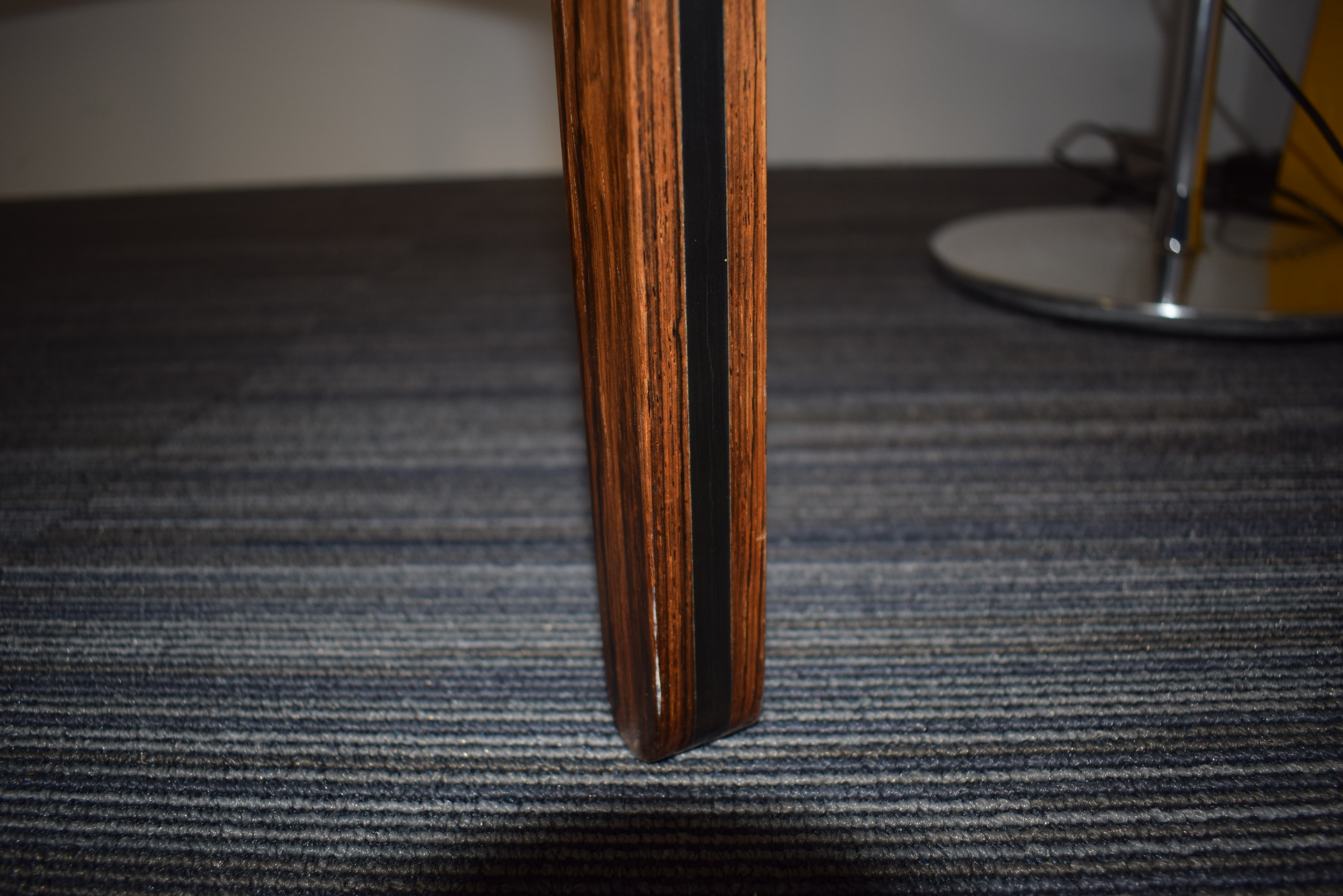 A 1960's rosewood and ebonised stool with black upholstery over a tri-form base *Sold subject to - Image 7 of 7