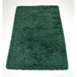 A Swedish rya rug in green, 190 x 126 cm CONDITION REPORT: No sign of moth.
