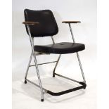 A 1970's tubular chair with black vinyl upholstery and teak arms *Sold subject to our soft