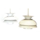 A graduated near pair of 1970's cream and white enamelled four-tier squat ceiling lights