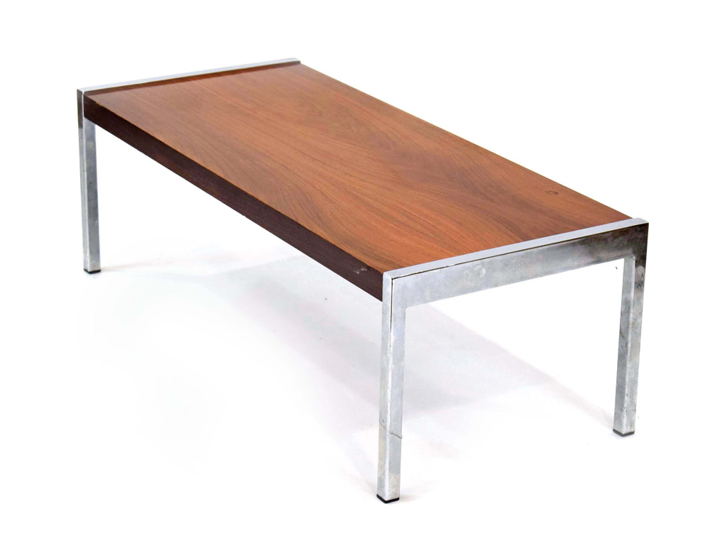 A 1970's rosewood coffee table with chromed supports, l.