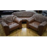 A 1980's Walter Knoll sofa in brown leather together with a pair of matching armchairs *Sold