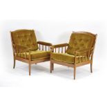 A pair of 1960/70's Swedish armchairs with beech frames and mustard button upholstery *Sold subject