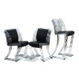 A set of eight Italian-style chromed steel stacking chairs together with three matching stacking