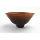 Carl Harry Stalhane (1920-1990) for Rorstrand, an orange and russet ceramic bowl of open form, d.