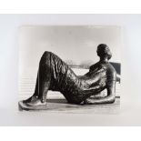 A photographic print depicting a Henry Moore sculpture,