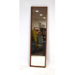 A 1960's teak framed rectangular wall mirror,