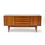 A 1960's White & Newton teak sideboard with four central drawers and two single doors,