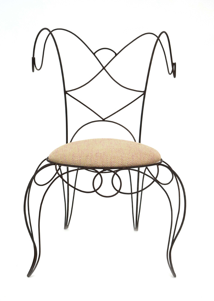 A 1980's 'Ram' chair designed by André Dubreuil,
