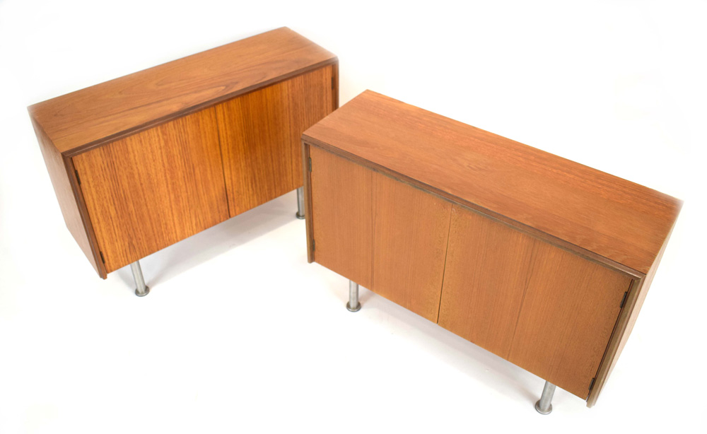 A pair of G-Plan teak low cabinets, each with a pair of doors on later spun aluminium legs, w. - Image 2 of 2