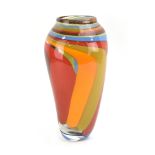 A contemporary cased-glass colourful vase of slender baluster form, h.