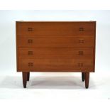 A Danish teak chest of four long drawers, each with moulded handles, by Sejling Skave, label verso,