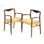 Kai Lyngfeldt for Soren Willadsen, a pair of 1960's Danish rosewood elbow armchairs of organic form,