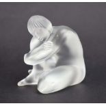 A French Lalique glass figure modelled as a crouching nude lady, signed, h.