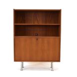 A 1970's teak adjustable bookcase with a fall-front, on later spun aluminium legs, w.