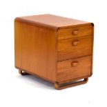 A 1980's teak pedestal of rounded form with three graduated drawers on sleigh-type legs,