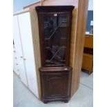 Reproduction mahogany glazed corner cabinet