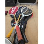 Collection of ping pong, squash and badminton racquets