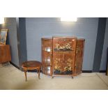 Early 20th Century walnut and chinoiserie decorated bow front cocktail cabinet and matching side