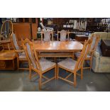 Ercol elm refectory style dining table and 6 chairs incl. pair of carvers Water damage, especially