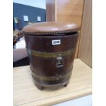 Oak and brass banded coal bin with brown faux leather surface