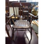 Elm seated and beech spindle back armchair