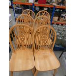 6 Beech wheel back dining chairs