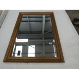 Rectangular bevelled mirror in gilt frame