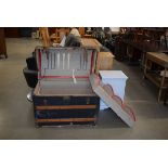 Dome top and wooden bound cabin trunk containing selection of Elizabeth George and other novels