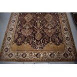 (12) A Remstaler Kerima carpet in shades of brown and mustard with foliate motifs approx. 250 x