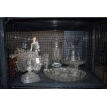 5539 - Cage containing a figure of a lady, glass peacock ornament, plus a celery vase, plates and