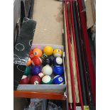 Cased pool cue, plus a boxed set of pool balls