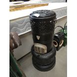 Black painted tin paraffin heater