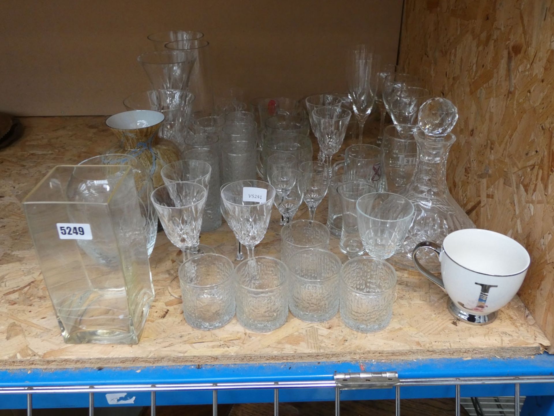 Quantity of wine glasses, tumblers, sherry glasses, vases and a decanter