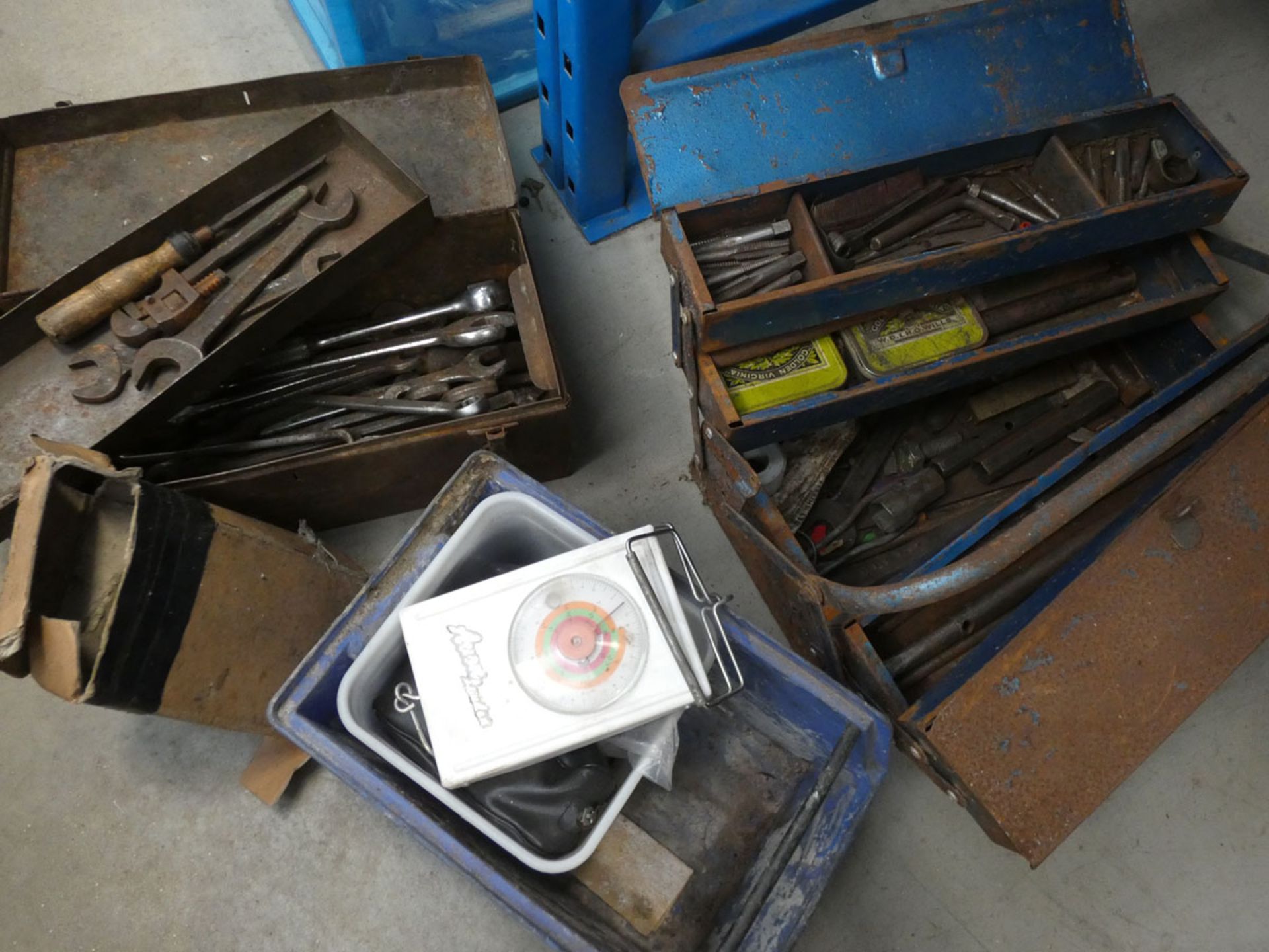 2 metal toolboxes containing a small quantity of tap dies, spanners, etc