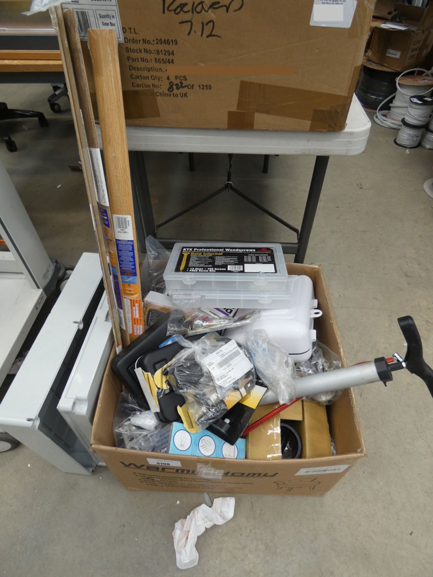 Box containing various items to include locks, screw boxes, bike pump, waterproof kits, door bars,