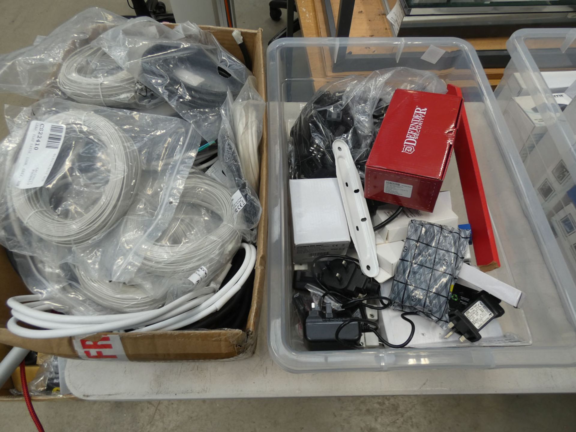 Box of power supplies, box of flat cables, angle cables, and Bullet security camera