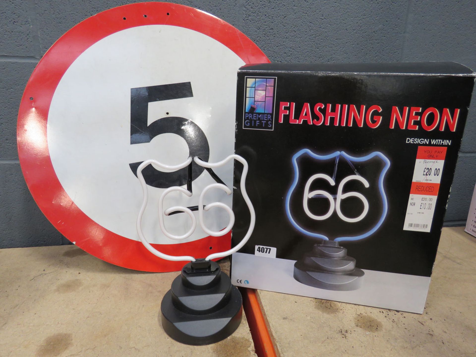 5mph sign and flashing neon Route 66 sign