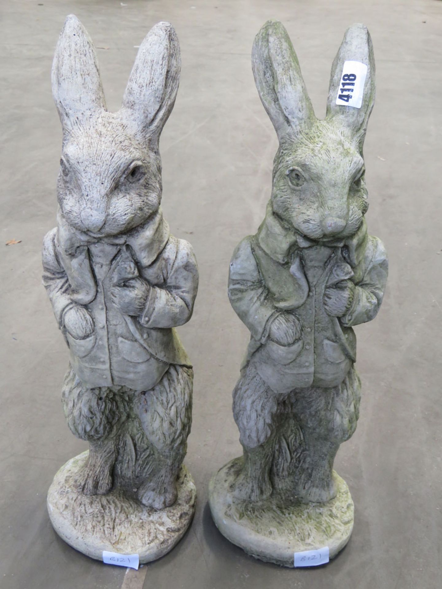 2 concrete figures of rabbits